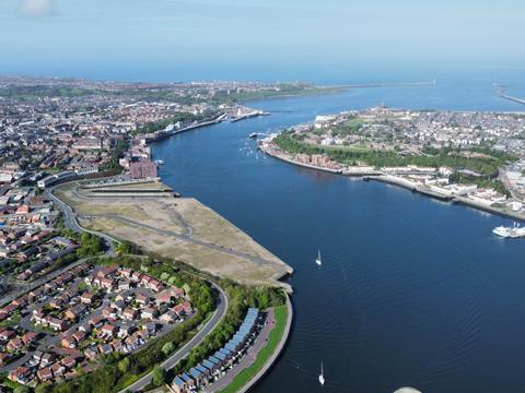 Drone view of a river mouth and its piers