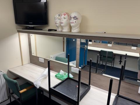 Dressing room with wig stands